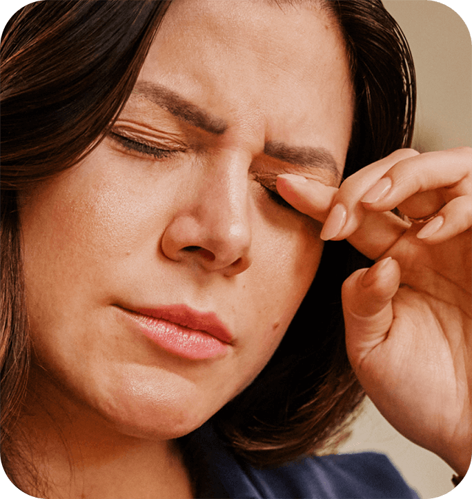 Person experiencing dry eye symptoms